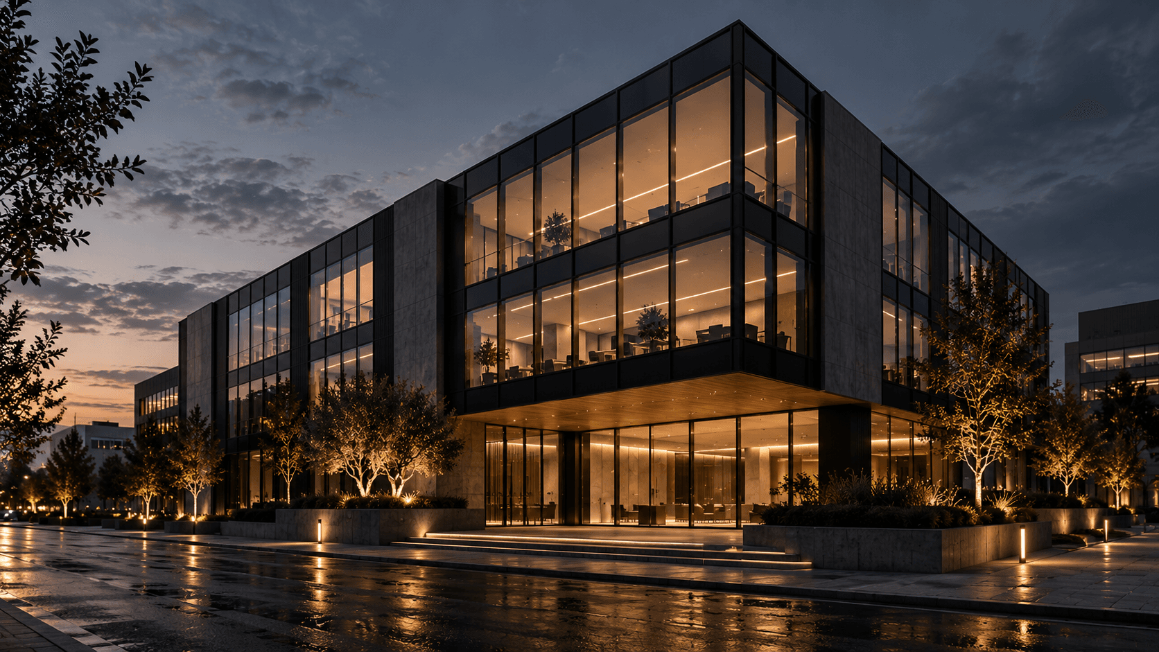 Quay Fourteen at dusk, glazed office floors above a lit, recessed entrance