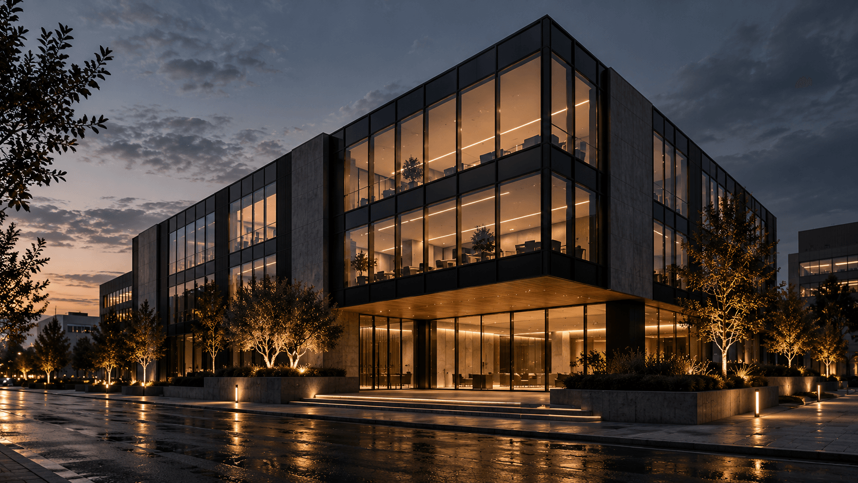 Quay Fourteen at dusk, glazed office floors above a lit, recessed entrance